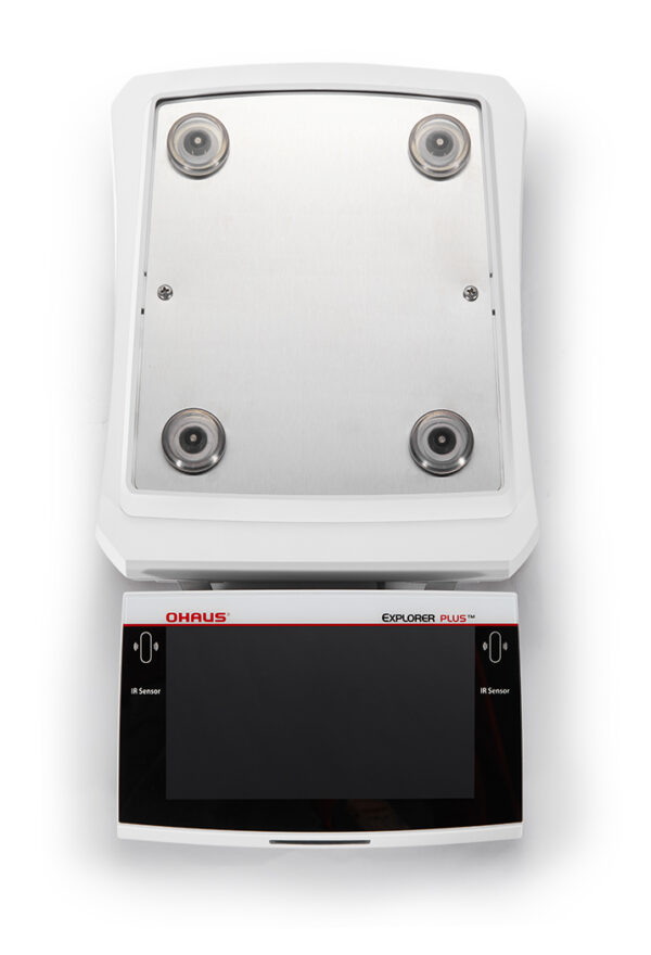 Ohaus Explorer Precision Balance viewed top down with weigh pan removed. White background.