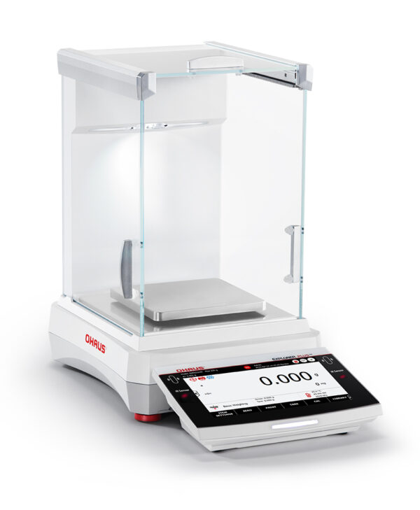 Ohaus Explorer Precision Balance viewed side on with wind guard. White background.