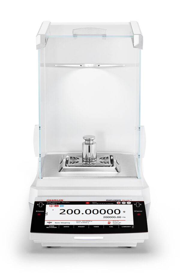 Explorer 2025 model Semi-Micro Balance Plus EXP being used with calibration weights, viewed front on white background.