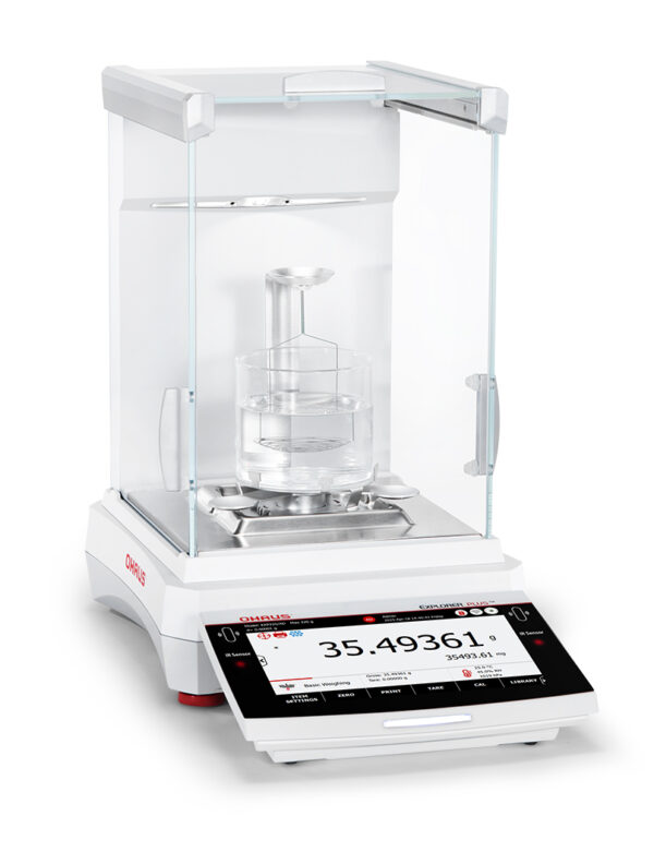 Explorer Semi-Micro Balance Plus EXP being used with beaker and liquid filling, white background
