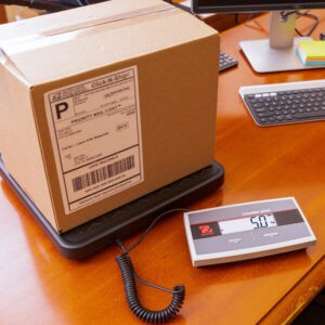Ohaus 3000 courier scale with box on top