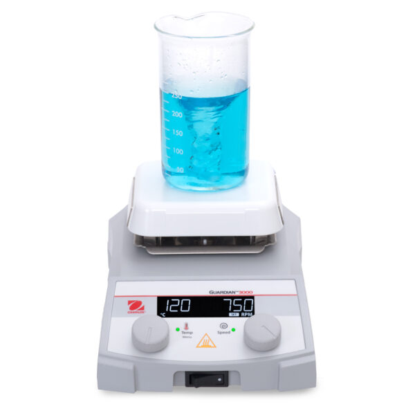 Hotplate Stirrer - Ohaus Guardian Hotplate Stirrer G3000. Beaker in situ for laboratory settings. White background.