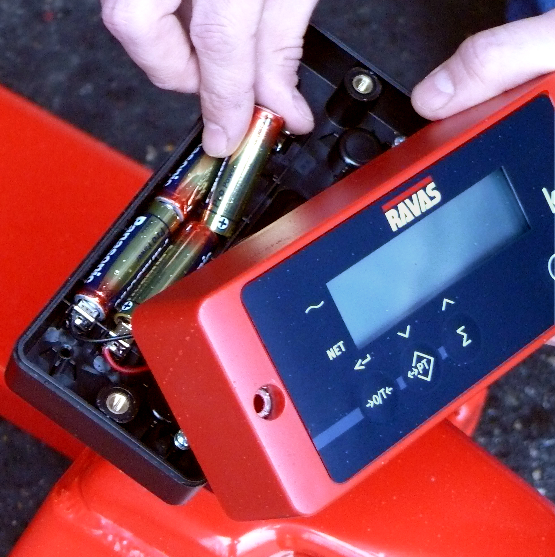 ravas-1100-battery-change RAVAS 1100 Pallet Truck Scale closeup of battery compartment